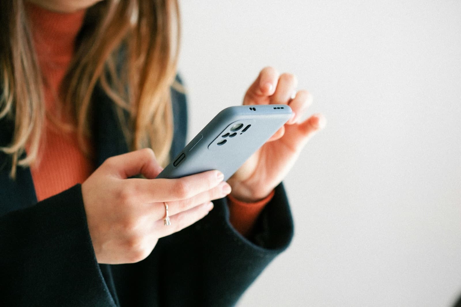 Person holding their phone